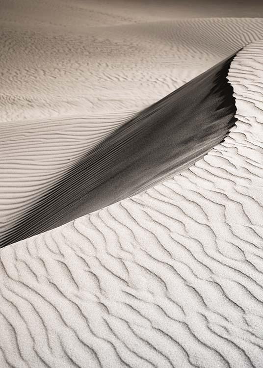 – Foto van een landschap met zandduinen. 