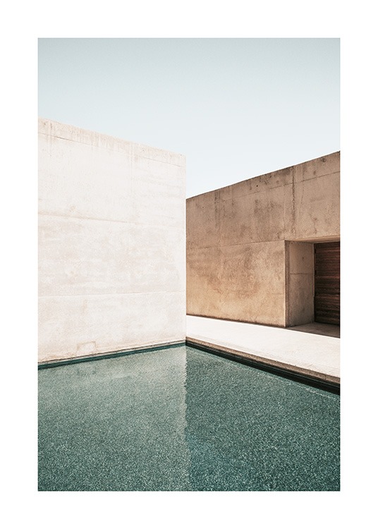  – Foto van betonnen gebouwen met daarvoor een groot zwembad
