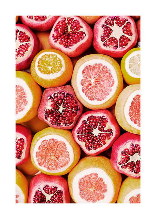 Foto van kleurrijke sinaasappelen, grapefruits en granaatappels