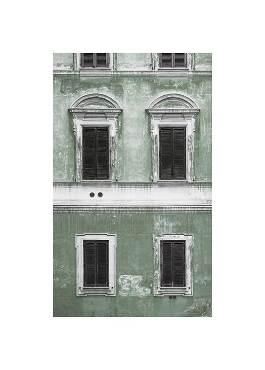  – Foto van een groene gevel met een vintage gevoel en zwart en witte ramen