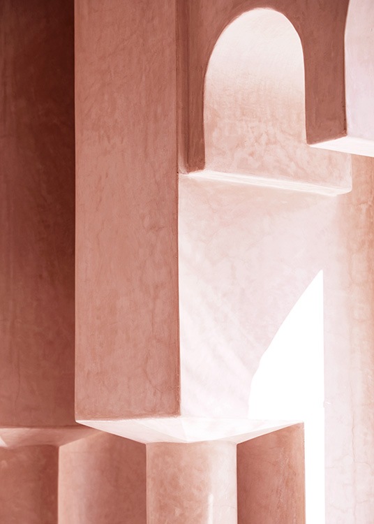 - Foto met details van een betonnen gebouw in roze met kleine bogen en pilaren