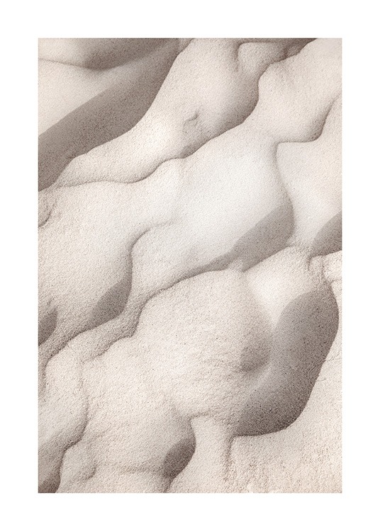  – Foto van beige zand dat abstracte figuren vormt