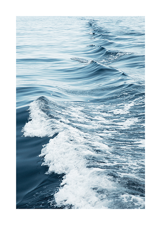 Foto van een oceaan, golven en zeeschuim